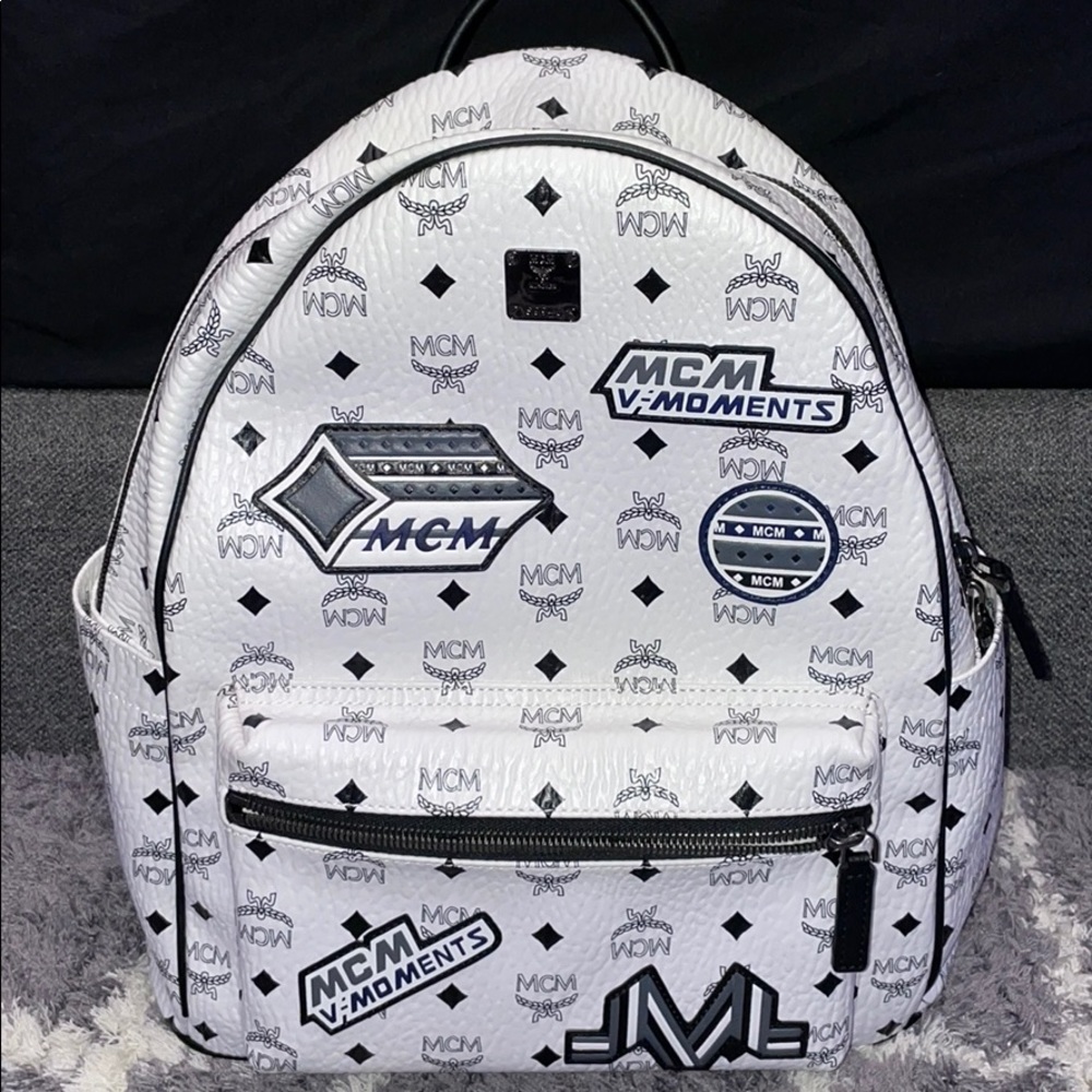 Authentic white MCM pass as new Color white
